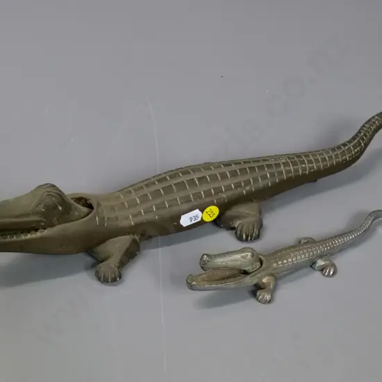 2 cast metal crocodile nutcrackers - smaller one has wear to chrome finish, larger brass one is L-380