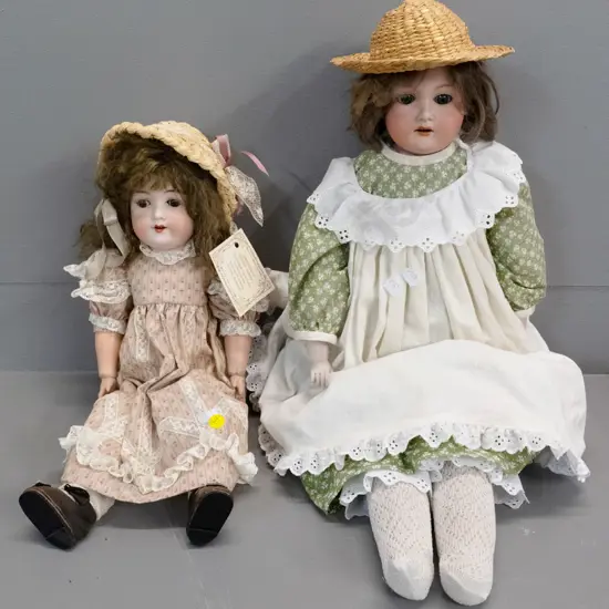 2 display dolls - smaller one with Beechworth Australia tag, larger is L-620