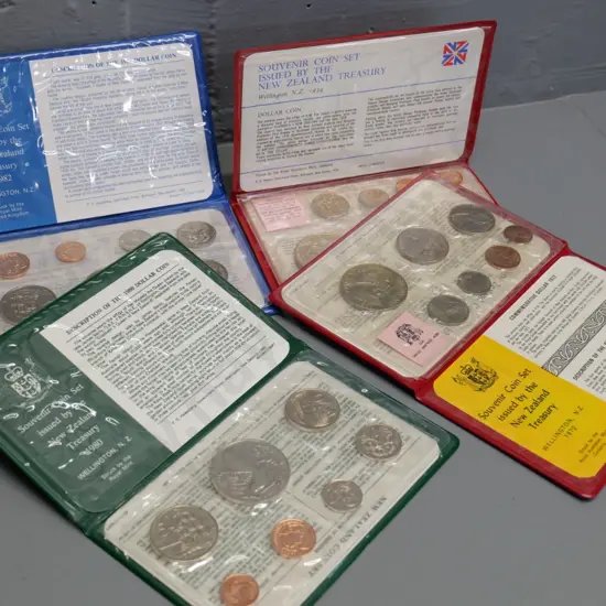 4 New Zealand collector's coin sets - 1972, 1974, 1980, 1982