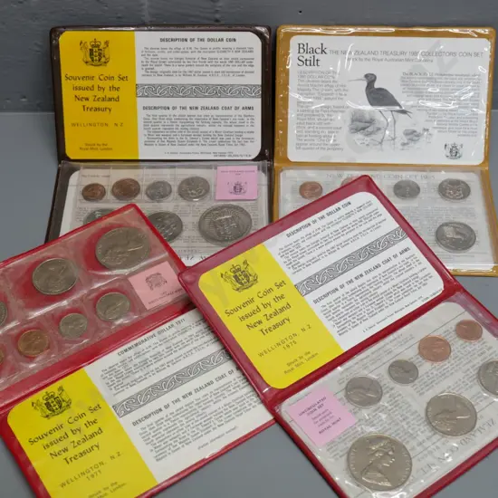 4 New Zealand collector's coin sets - 1971, 1974, 1975, 1985