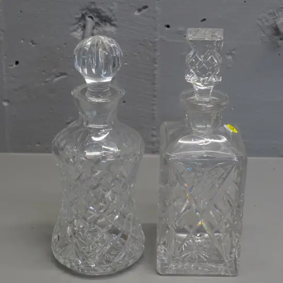 2 cut crystal stoppered decanters - both approx. H-260