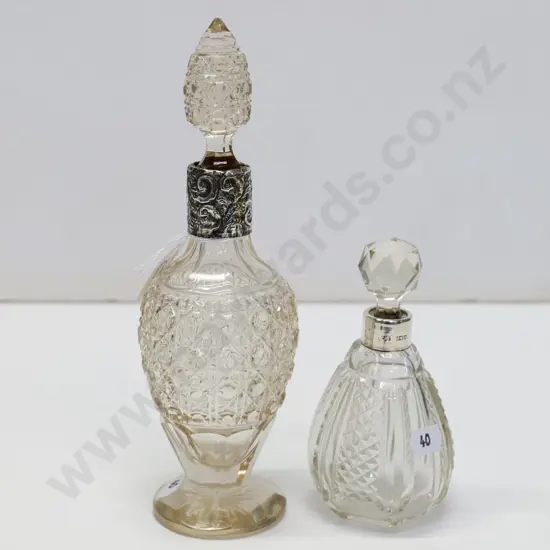 2 vinagrette bottles both with silver band stamped with lion & shield