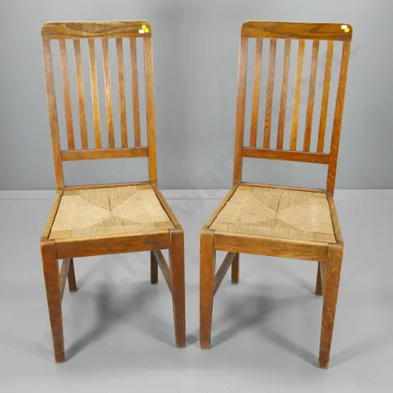 pair of oak deco-style slat back dining chairs, fading to polish, some damage to seagrass, H-1020 W-430 D-410