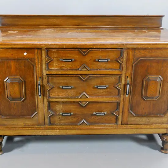 deco style oak sideboard w/upstand back, 3 drawer, 2 door, one handle damaged, water marks to top H1050 W1470 D530