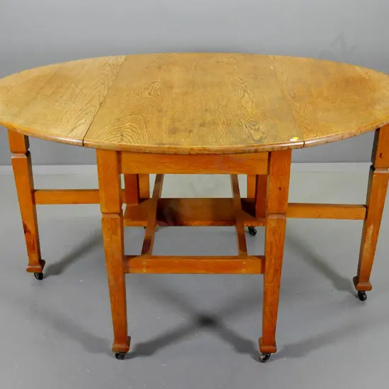 deco oak drop-side dining table on original metal casters - some marks to finish H-770 W-1000 L-1320 extended