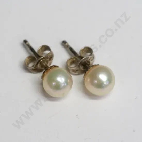 pair of pearl stud earrings