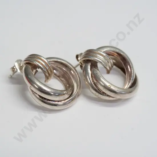 pair of silver earrings stamped 925