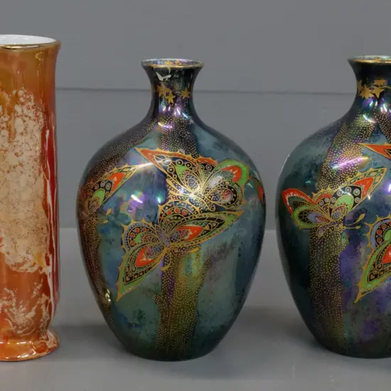 pair of Crown Devon Rural Lustrine butterfly motif lustre vases - one with obvious repair - & orange lustre vase H-160