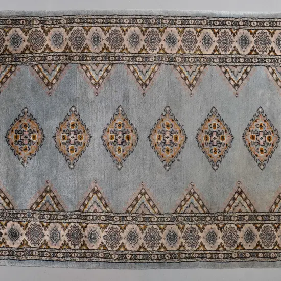 Pakistani woven wool Persian style floor rug - pale blue, cream, pink and gold - some spot marks L-1530 W-980