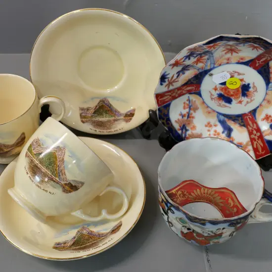 2 Crown Devon Mitre Peak souvenir cups & saucers and an Imari moustache cup & saucer