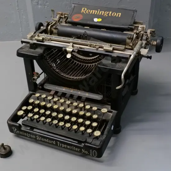 vintage Remington Standard No. 10 typewriter - one foot has come off