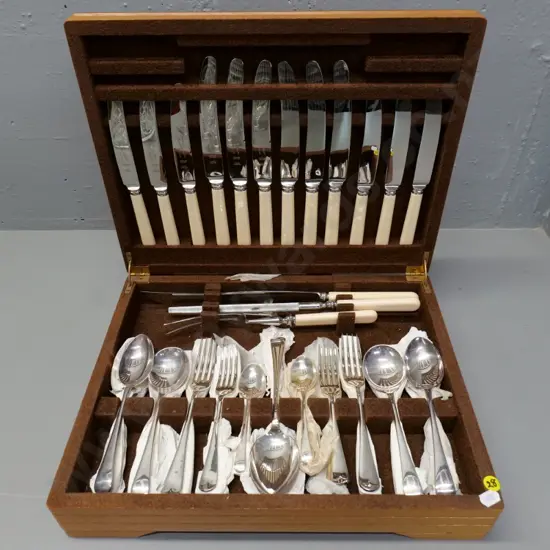 wood-cased 6-place cutlery set with bone-handled knives and carving set