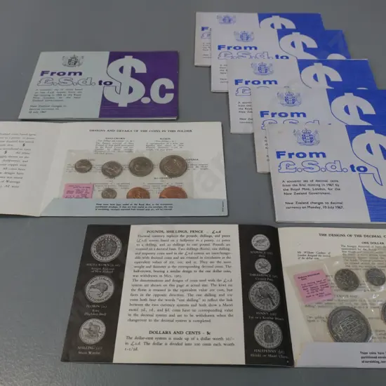 8 New Zealand decimal change-over uncirculated coin sets - 6 are decimal sets