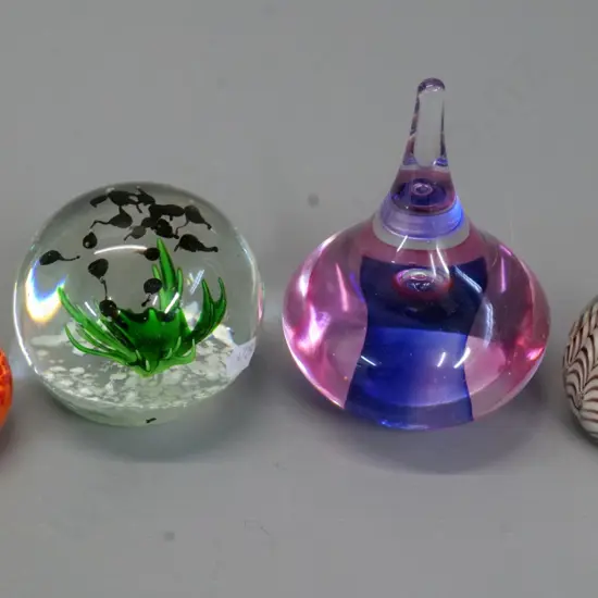 4 glass paperweights - tallest one marked Murphy H-120