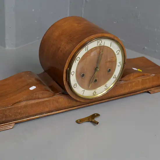 deco wood-cased chiming mantel clock, with key, movement stamped Made in Germany. H-240 W-650