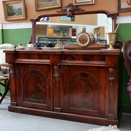 antique mahogany sideboard with carved mirror back, 2 doors, 2 drawers, carved corbels, polish wear H1530 W1520 D530