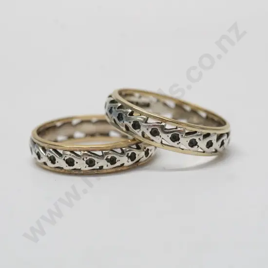 2 9ct silver rings stamped 9ct & sil