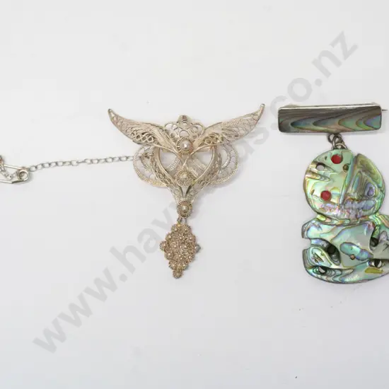 filagree brooch with safety chain & paua shell tiki brooch
