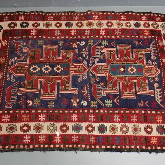 small hand-knotted wool rug / prayer mat - some wear to edges L-1050 W-750