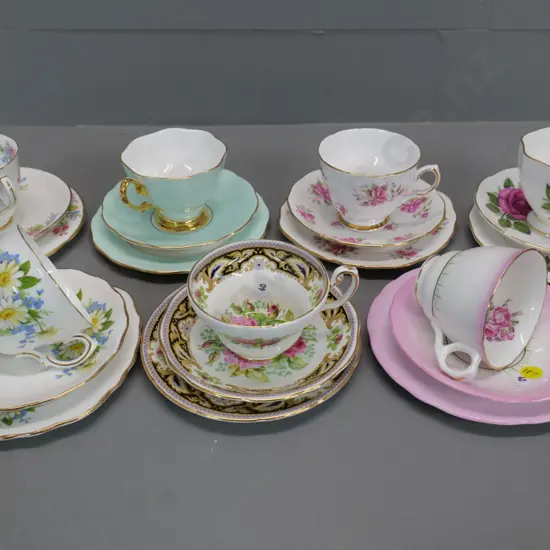 7 English fine bone china trios including Royal Albert, Foley, Royal Stafford, etc.