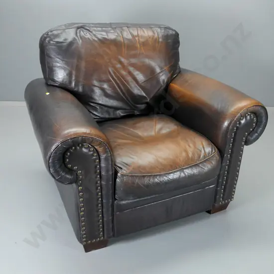 club style heavy studded rolled-arm leather chair with antiqued finish brown leather, some fading H-940 W-1060 D-950