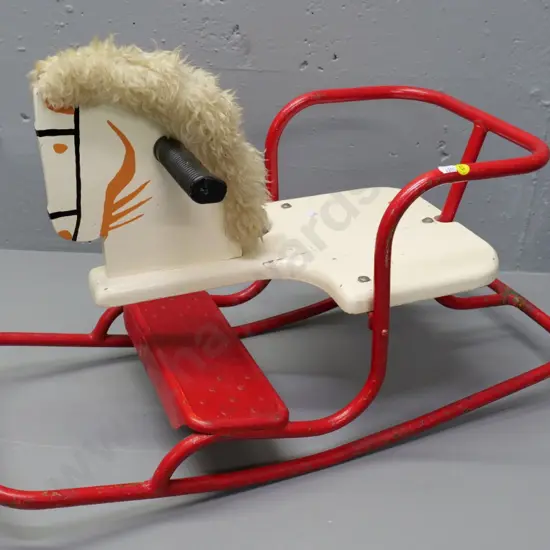 vintage Triang metal framed rocking horse with wooden seat, replaced hand grips, some chips H-420 L-680 W-280