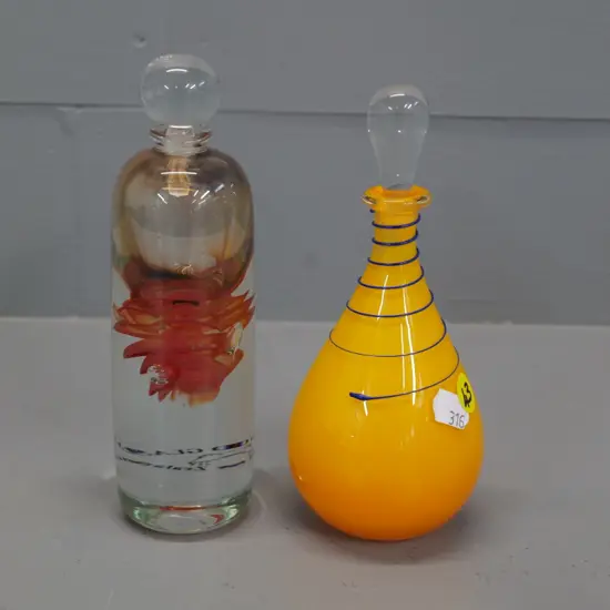 2 art glass scent bottles, one heavy clear based Hoglund H-170 and an unmarked orange with blue swirl