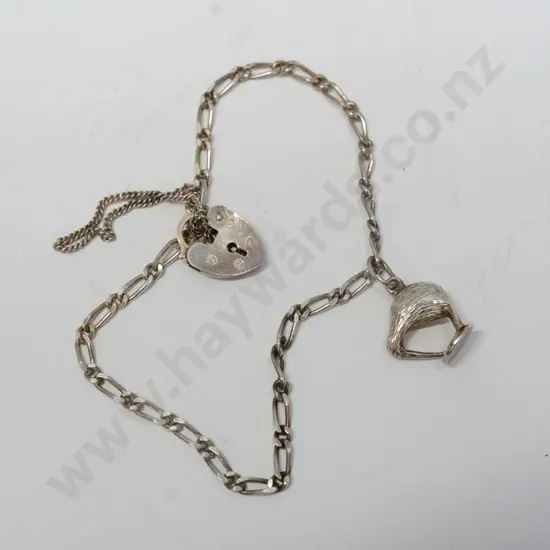 silver charm bracelet with a kiwi charm