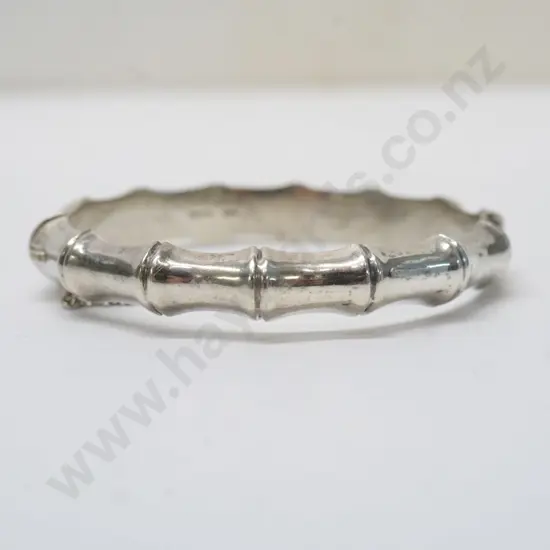 silver bangle with safety chain stamped H&S silver