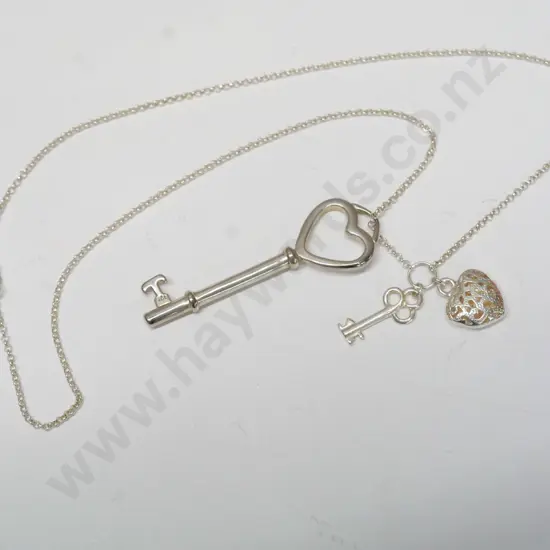 silver necklace with 2 keys & a heart. large key & chain stamped 925