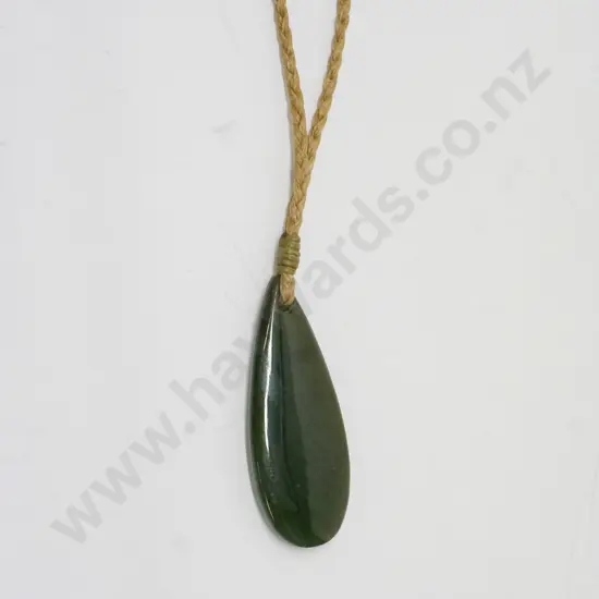 2 greenstone pendants