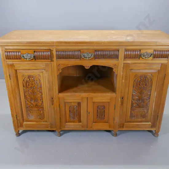 vintage kauri sideboard, 3 drawers & 4 doors with carved fronts, borer in back, polish needs work H1000 W1520 D490