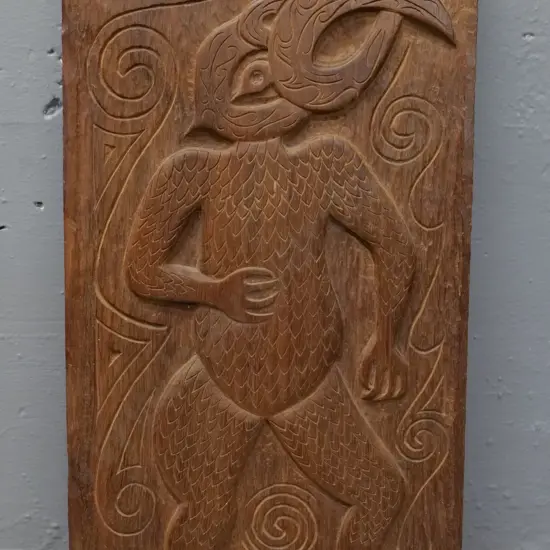 carved timber panel with ethnic stylised figure H-430 W-235