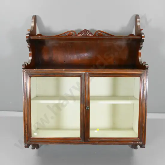 vintage dark stained rimu wall cabinet w/ 2 glazed doors and carved back rail, internal shelf. H1080 W810 D290