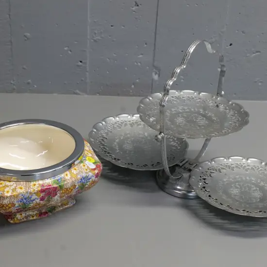 chrome rimmed Royal Winton Marguerite salad bowl and a folding 3-plate serving stand