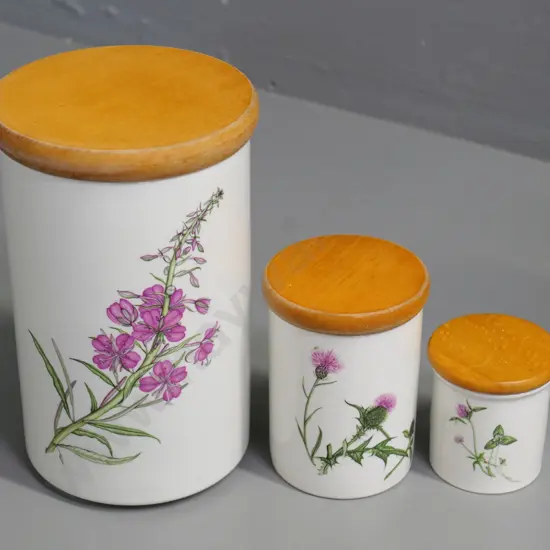 3 Portmeirion 'Queen's Hidden Garden' pattern storage canisters - slight wear to wooden tops - largest is H-220
