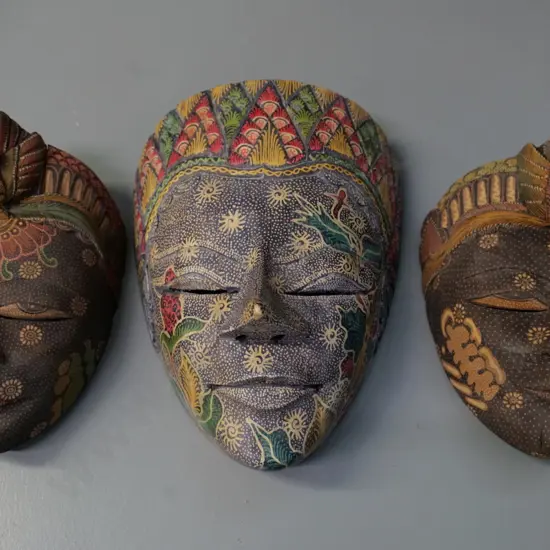 3 Indonesian wooden wall masks - crack to one, chip to nose of largest H-210