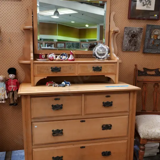 solid native timber dressing table w/bevelled mirror, 6 drawers, 2 w/burr totara fronts. Some splitting H1900 W1060 D480