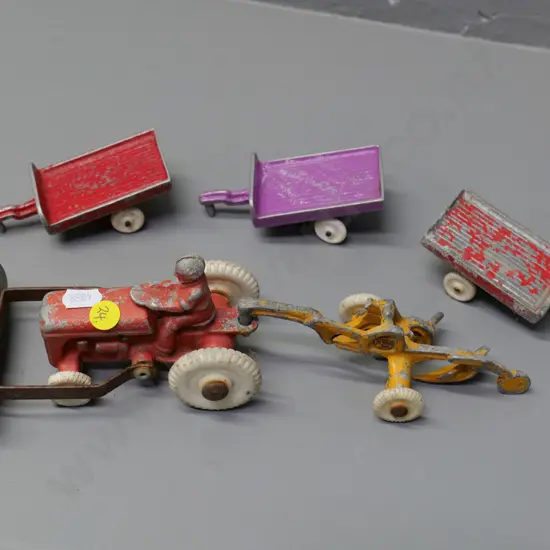 Fun Ho tractor with plough and 3 assorted Fun Ho trailers - general wear. Tractor H-80 L130