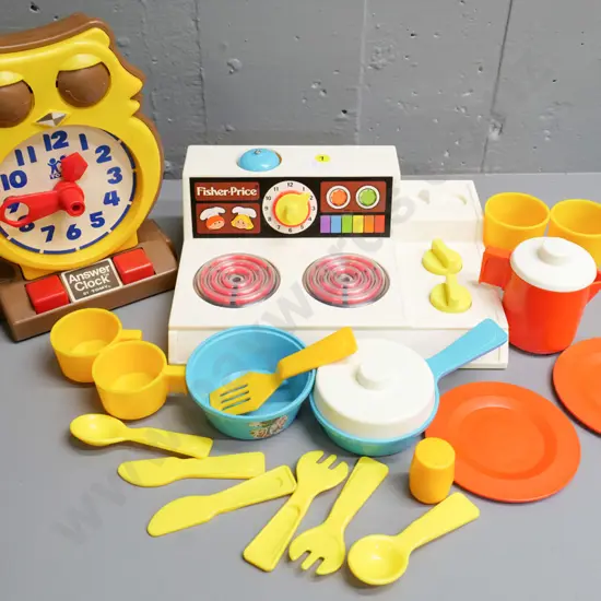 retro toys - Fisher Price kitchen cooking set and a Tomy Answer Clock H-250 W-170