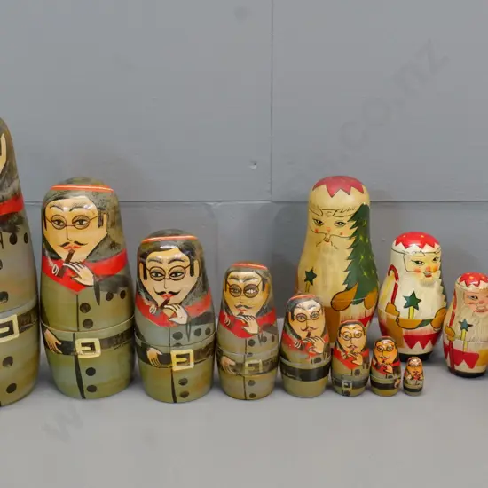 2 sets of hand painted wooden Babushka nesting dolls 8 'portrait' style and 5 Santa Claus - largest is H-210