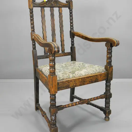 vintage oak-framed occasional chair w/carved top rail. fading to floral tapestry, wear to polish H1140 W580 D600