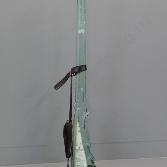 retro large glass rifle-shaped Hijos De Villa Tequila bottle with leather strap L-900