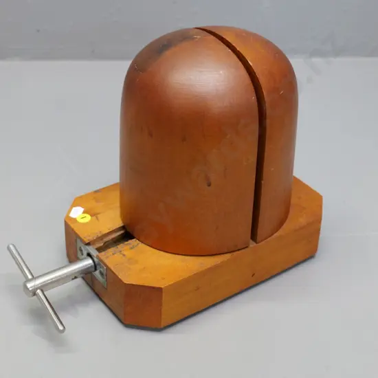 adjustable wooden hat block with chrome handle, etched size markings H-250 L-300