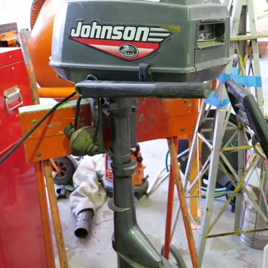 Johnson small outboard motor with cleaning muffs - stand not included