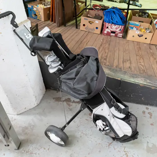 golf clubs and trundlers