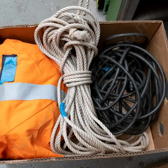 box; overalls, rope, extension cord
