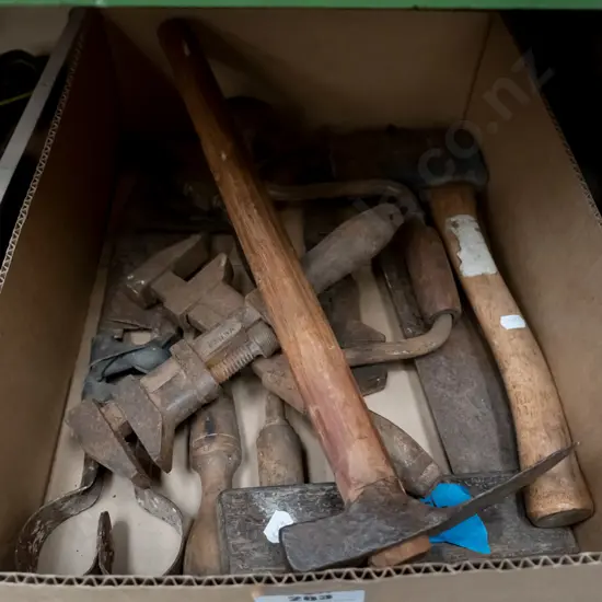 box; hand held grubber, axe, stilsons etc