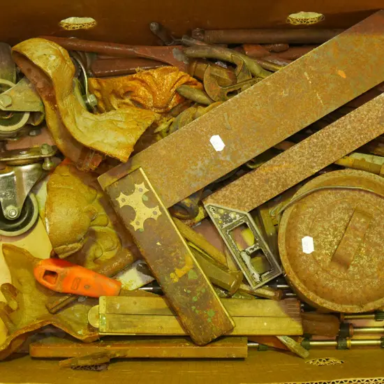 box; cast iron claw and ball foot legs, builder's squares, rule etc