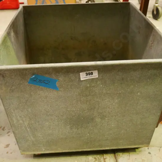 galvanised tin container on wheels